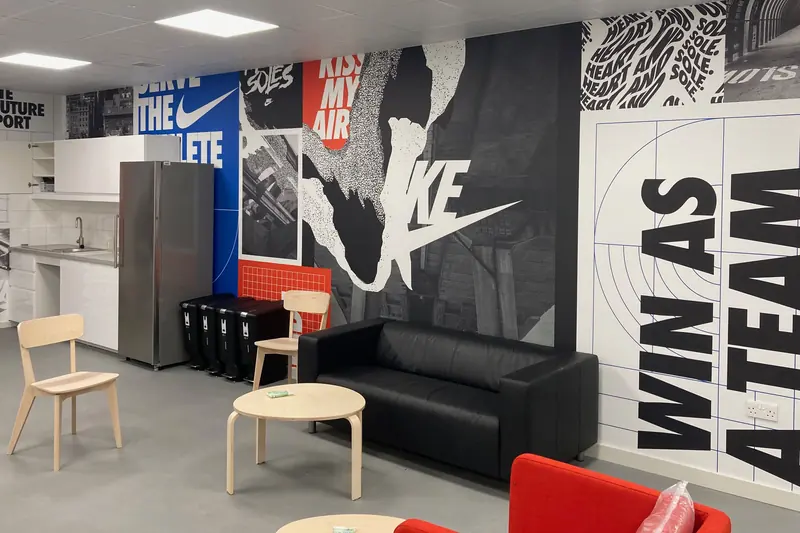 Nike wall graphics being installed