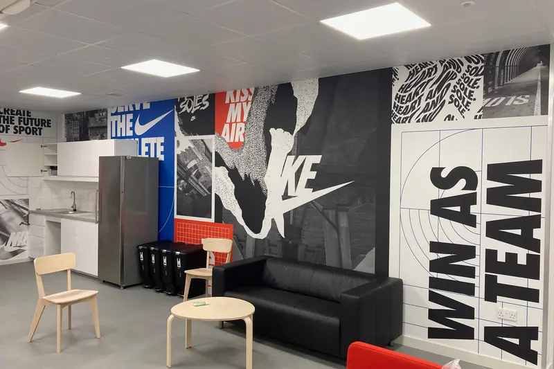 Nike wall graphics installed in a store staff area