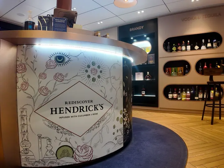 Onboard bar and retail area with a graphic-wrapped counter