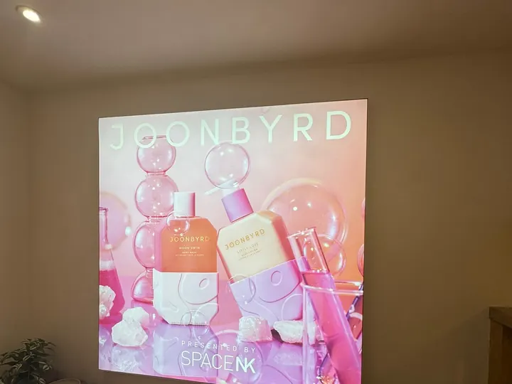 Joonbyrd lightbox graphic installed in a Space NK store