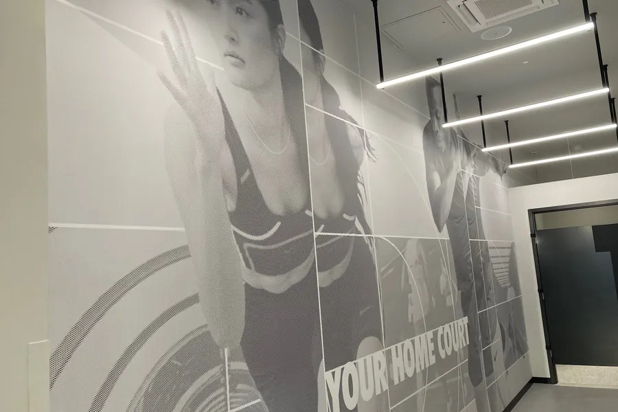 Completed Nike wall graphics in a store fitting area