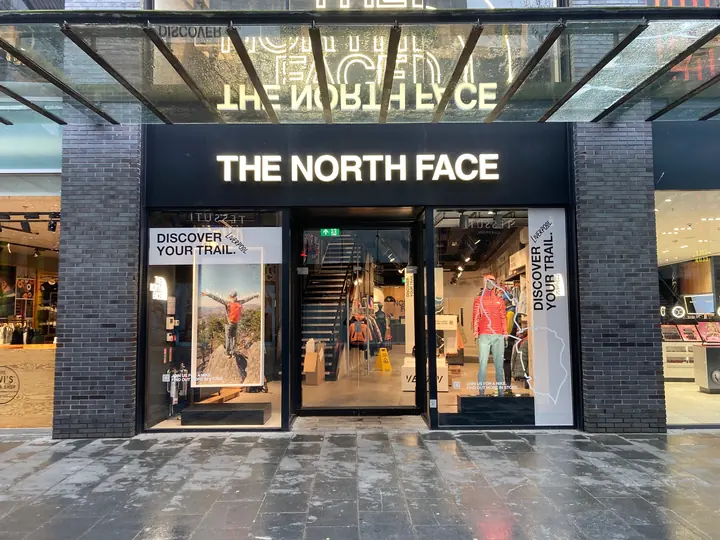 The North Face store front with window graphics